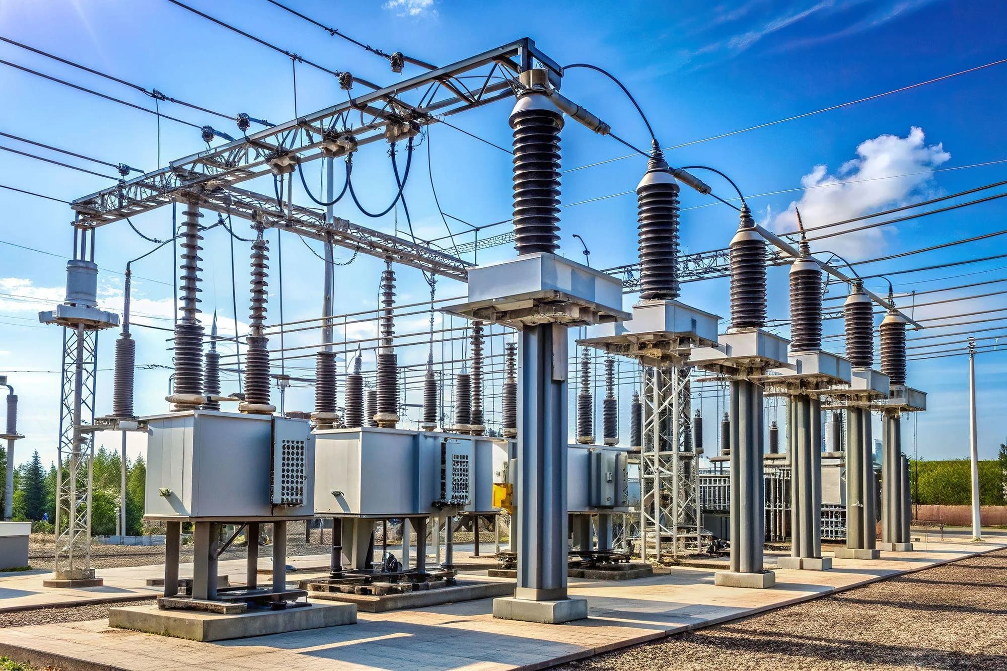 Bare ACSR conductors used in overhead power substation connections.